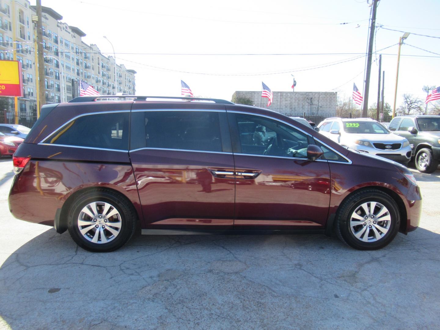 2016 Red /Tan Honda Odyssey EX-L (5FNRL5H62GB) with an 3.5L V6 SOHC 24V engine, Automatic transmission, located at 1511 North Shepherd Dr., Houston, TX, 77008, (281) 657-1221, 29.798361, -95.412560 - 2016 HONDA ODYSSEY EX-L VIN: 5FNRL5H62GB103369 5 F N R L 5 H 6 2 G B 1 0 3 3 6 9 VAN 3.5L V6 F SOHC 24V GASOLINE FRONT WHEEL DRIVE - Photo#36